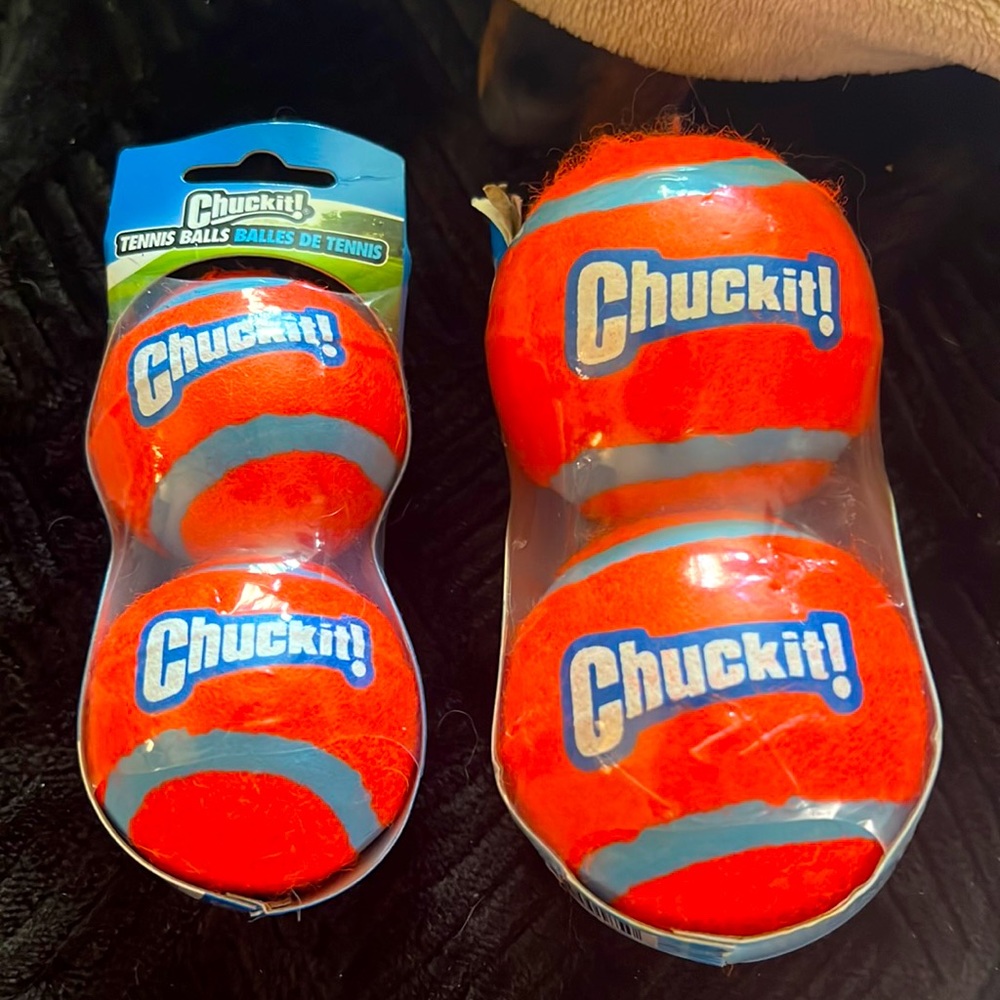 2 sets of Chuckit balls. Regular & Mini
